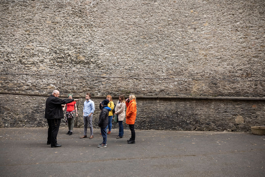 Visitors learning about the history of Shepton Mallet Prison