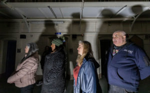 Visitors taking part in Ghost Hunting Behind Bars